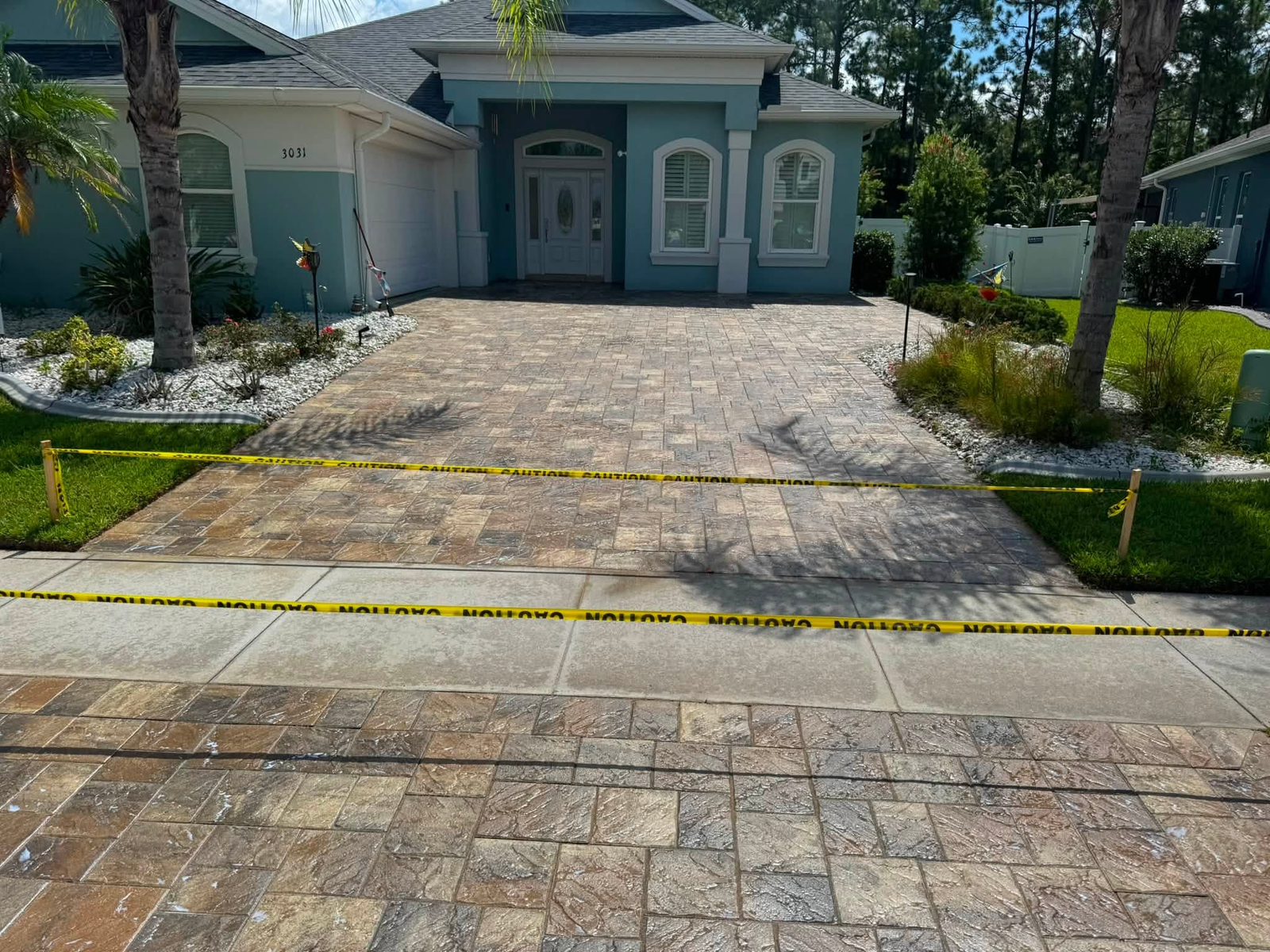 Sunshine Pressure Washing paver cleaning result at a Florida home