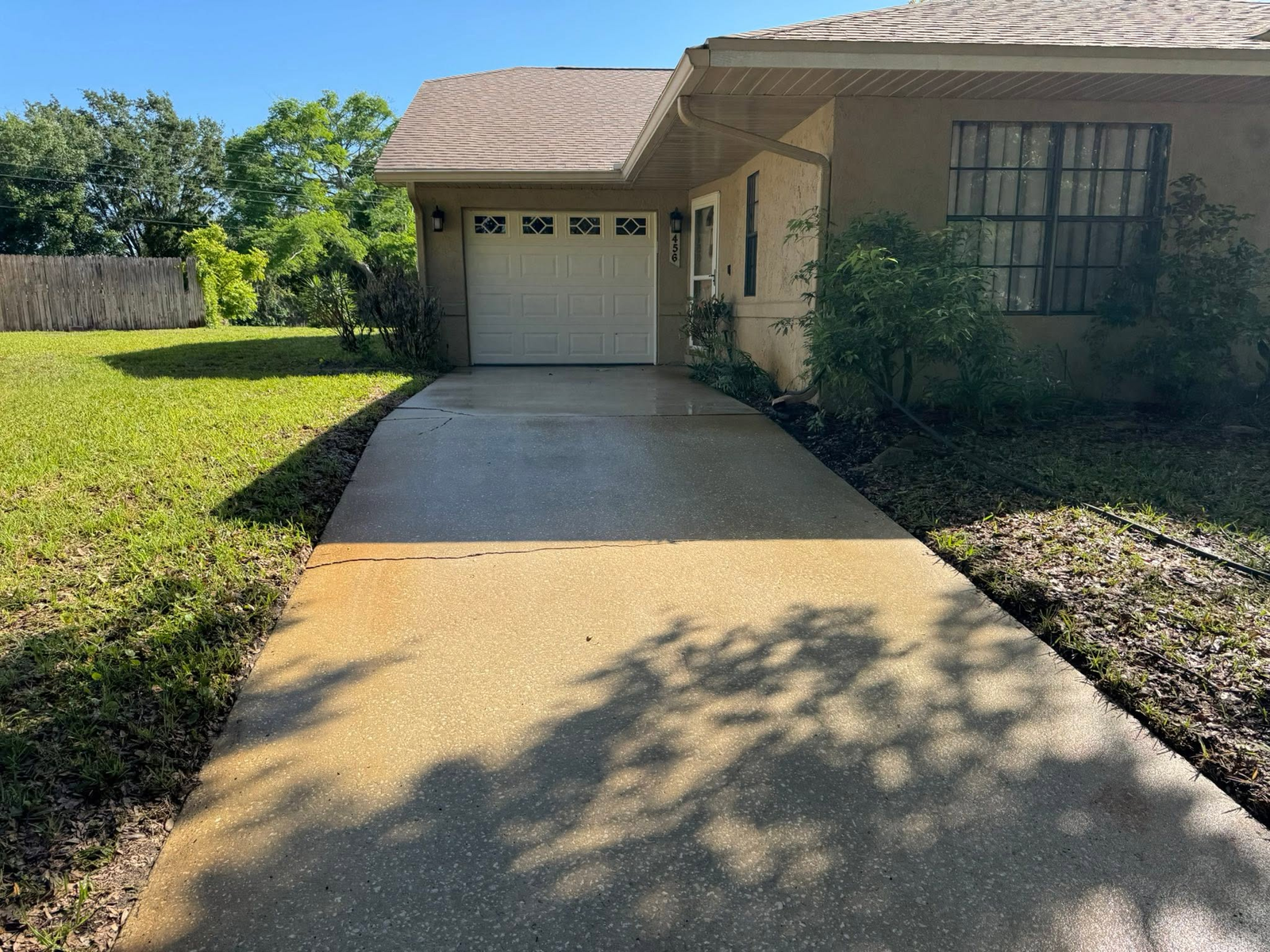 Driveway after pressure washing by Sunshine Pressure Washing