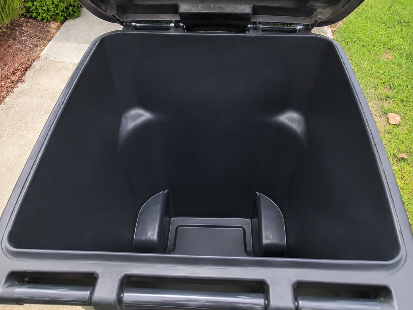Clean trash can interior after professional cleaning